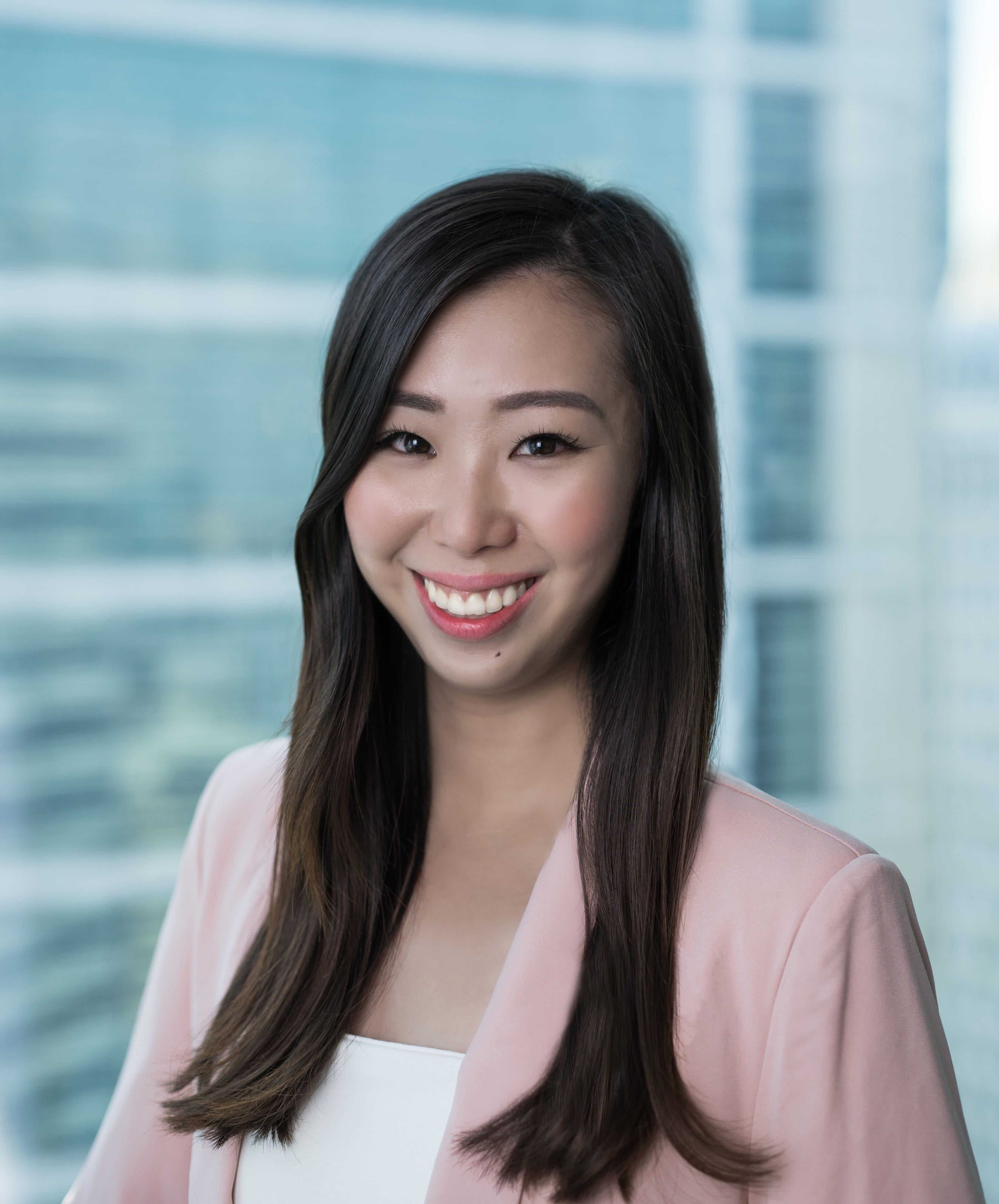 A smiling woman portrait in an office setting